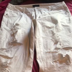 All white distressed skinny jeans